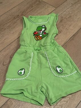 Green Yoshi Graphic Romper. Purchased at Universal.